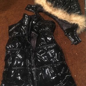 Sleeveless jacket with hood